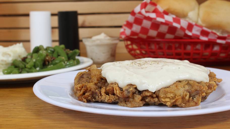 Chicken Fried Steak and Gravy With Mashed Potatoes in Rural Cafe Restaurant