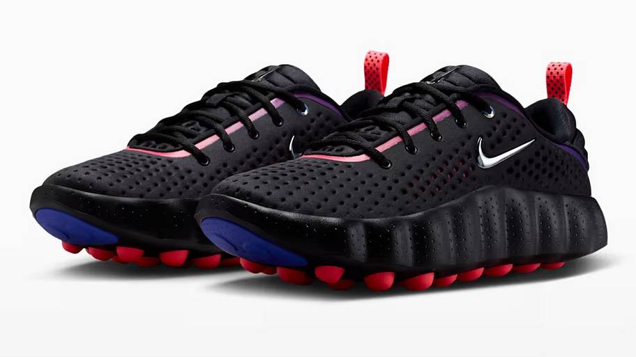 Side view of the Nike Mind 002 AMP 'Black and Indigo Burst' colorway.