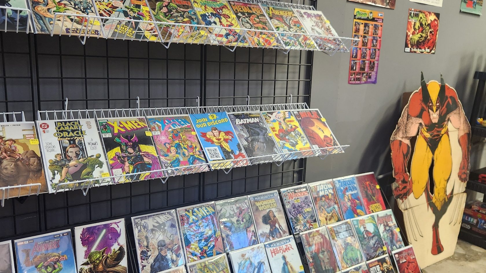 Various comic books displayed at a comic book store in Commerce, Georgia.
