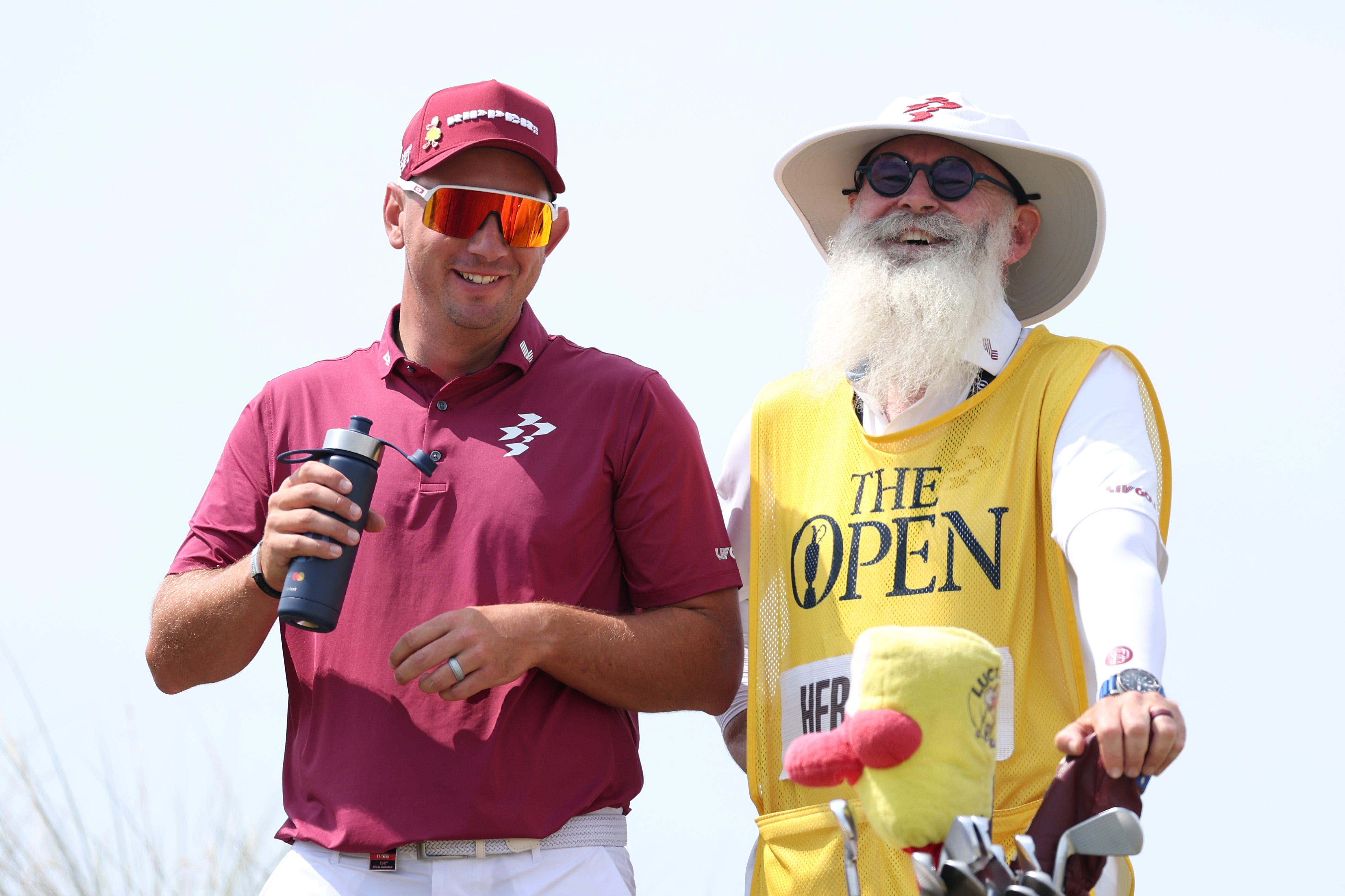 Lucas Herbert of Australia interacts with his caddie, Nick Pugh 13th tee on day two of the The 154th Open Championship at Royal Birkdale on July 17, 2026 in Southport, England.