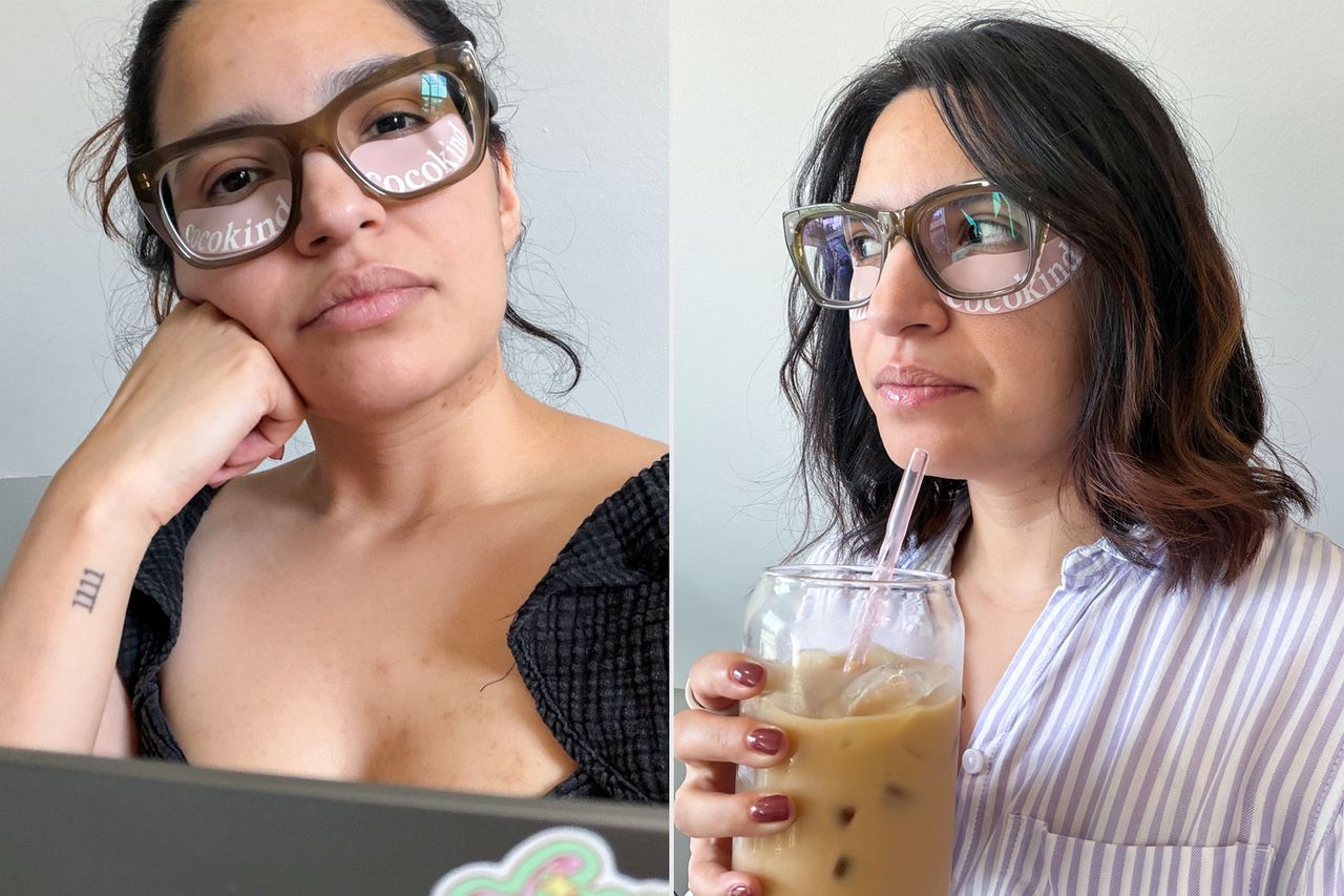 Two women wearing silicone eye patches one looking at a laptop and the other holding an iced drink