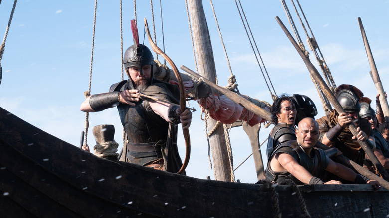 Odysseus shooting an arrow from the ship in The Odyssey