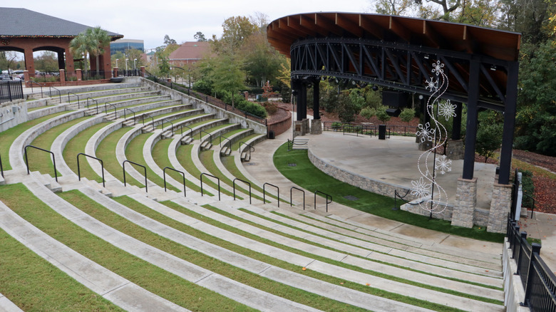 Tiered seating in front of a covered stage at the Icehouse Amphitheater in Lexington.