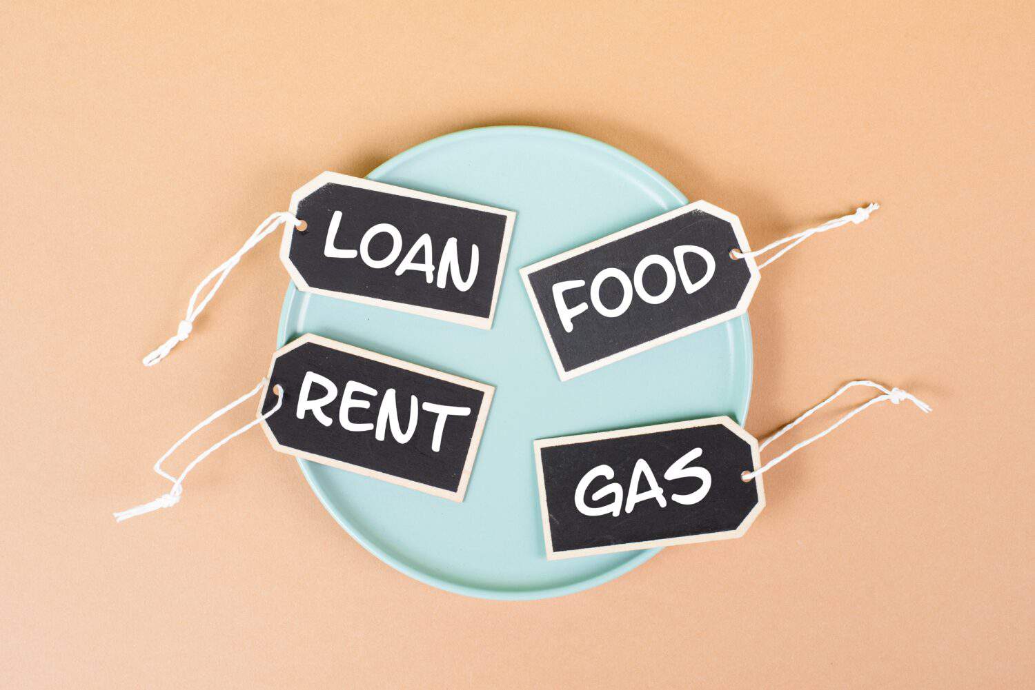 Global increasing prices , high living expenses, food, gas, rent and loan costs standing on tags, empty plate, inflation