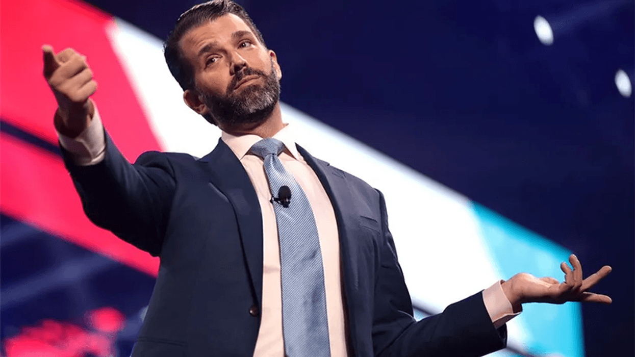Donald Trump, Jr. speaking with attendees at the 2021 AmericaFest at the Phoenix Convention Center in Phoenix, Arizona. Image via Gage Skidmore.