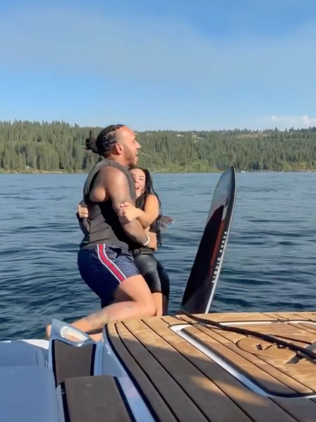 Lewis Hamilton and Kim Kardashian on a boat.