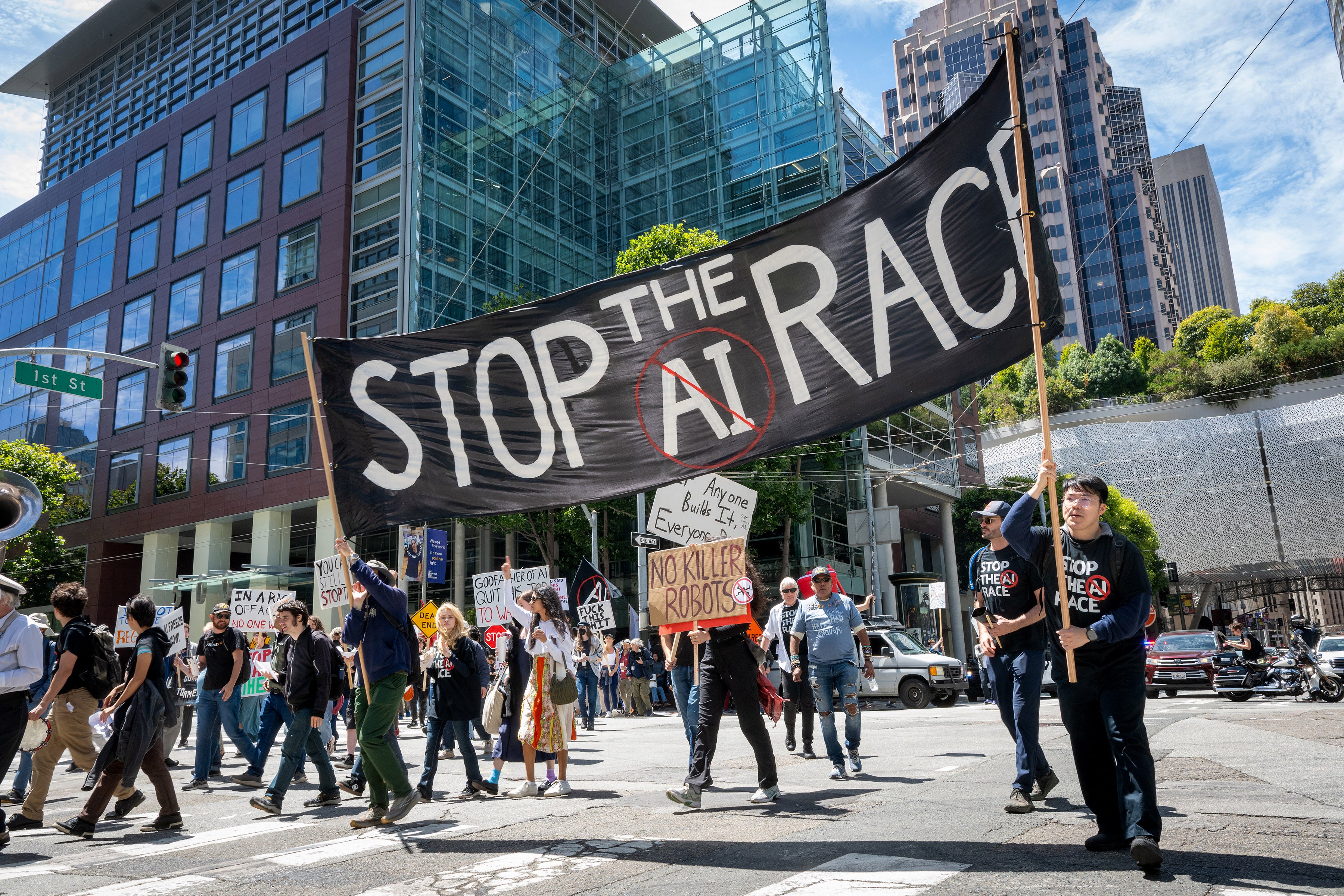 Demonstrators participate in the