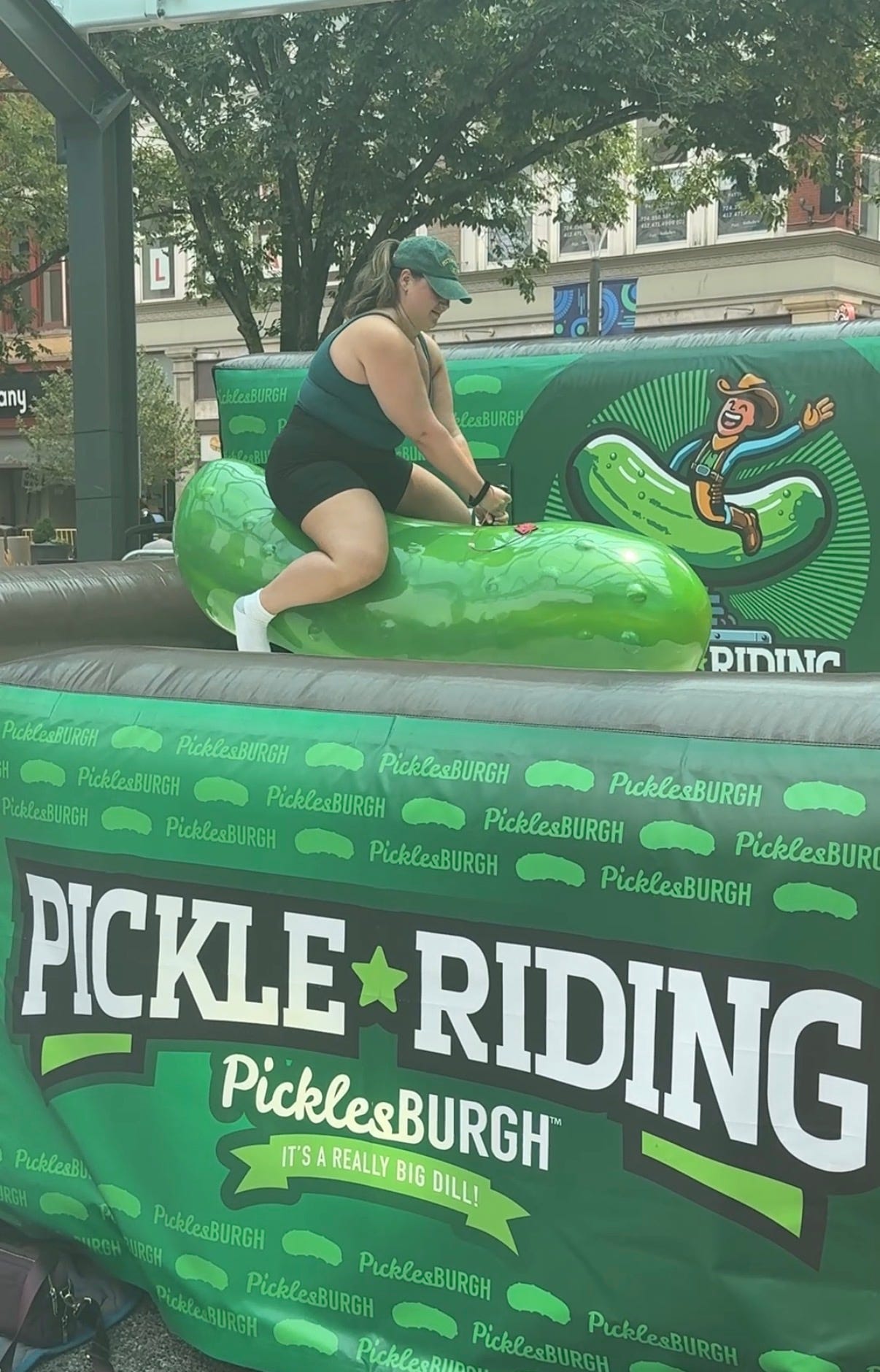 Event-goers test their bravery on the pickle bull and explore other fun activities beyond eating and drinking pickle-flavored delights