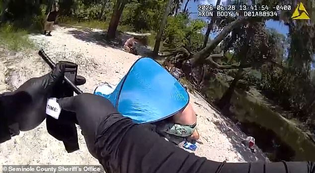 The alligator grabbed Clark and took her into a death roll, which caused severe injuries. A responding officer's body camera shows him preparing what appears to be a tourniquet while Allison seems to be tending to Clark under the tent