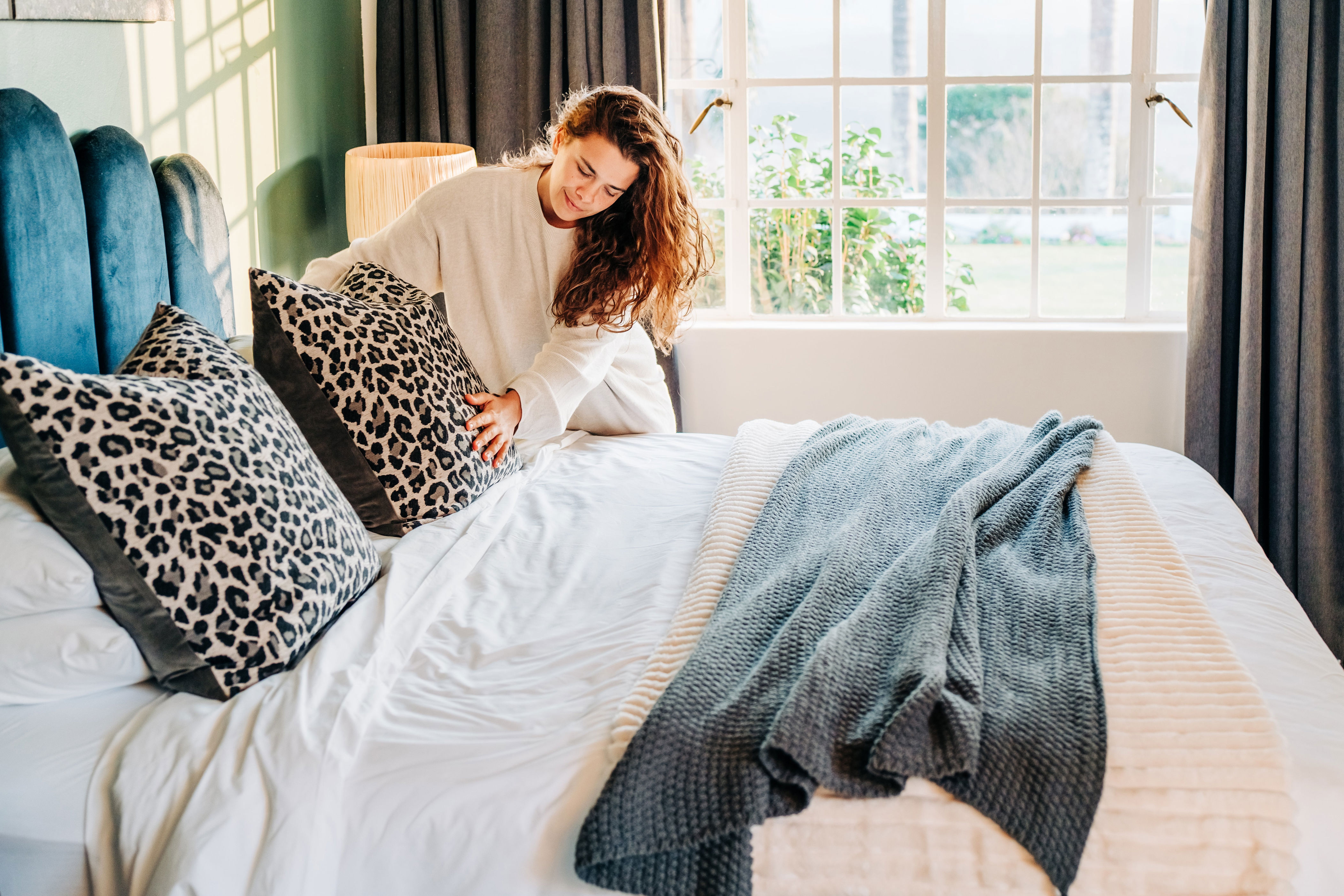 A person making the bed