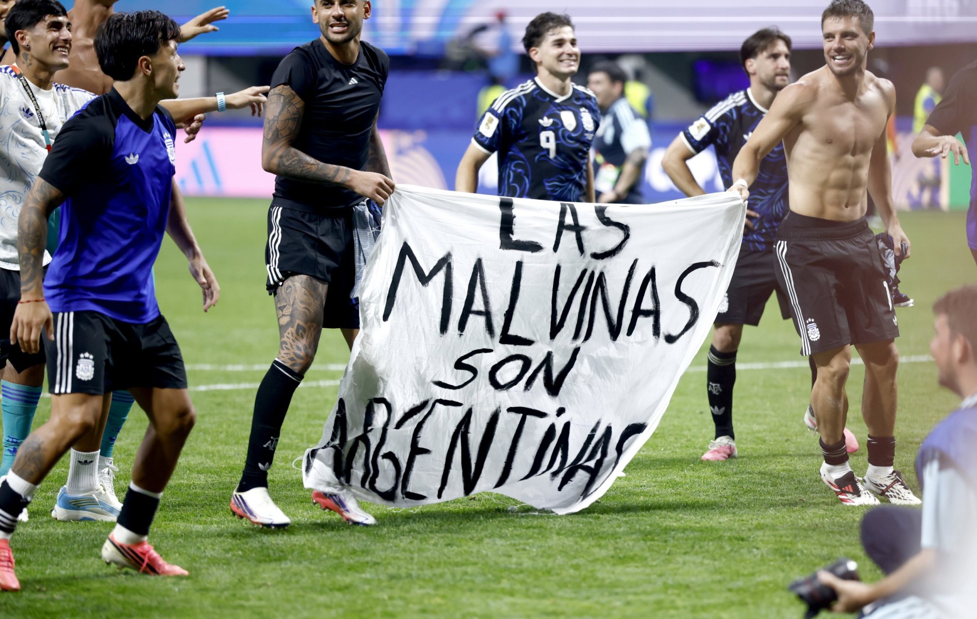 Players of Argentina hold a banner reading 'The Falkland Islands are Argentine' as they celebrate their victory in the FIFA World Cup 2026 semifinals match England against Argentina, in Atlanta, USA, 15 July 2026. EPA/WILL OLIVER