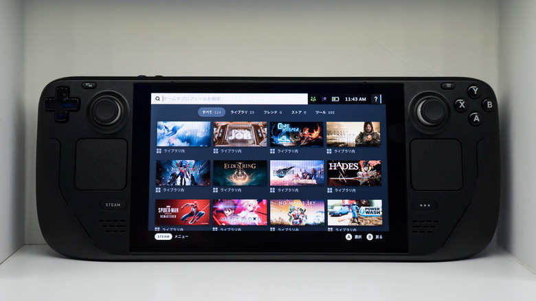 A Steam Deck showing a user's game library.