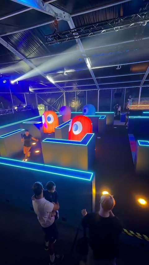 Woman plays life-sized Pac-Man game in Singapore