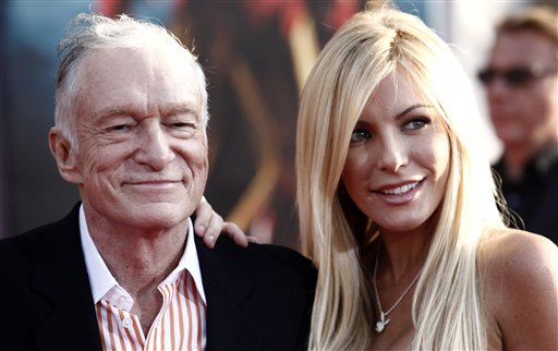 In this April 26, 2010 file photo, Hugh Hefner and Crystal Harris arrives at the premiere of