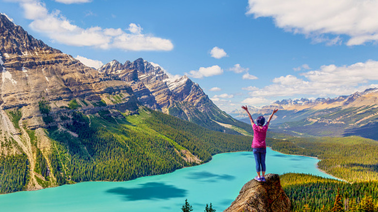 A woman on an overlook in Banff National Park.
