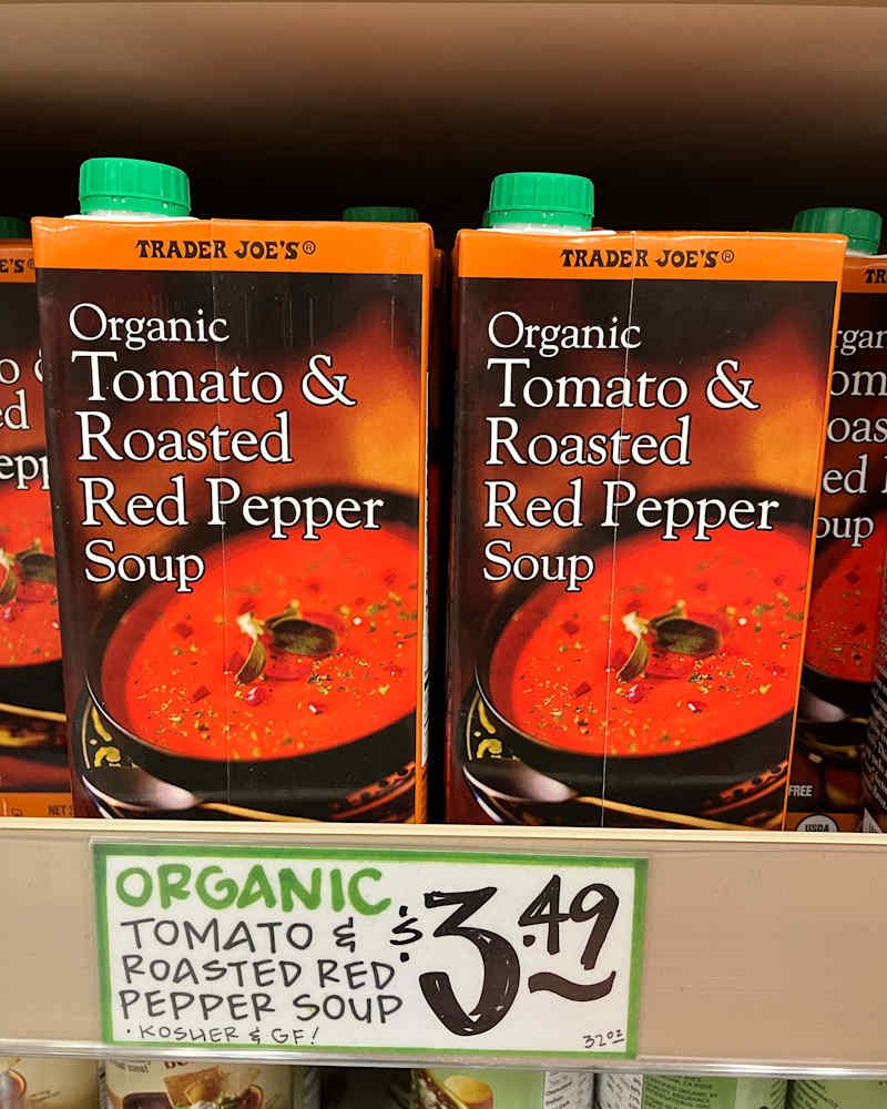 Cartons of Trader Joe's organic tomato and roasted red pepper soup.
