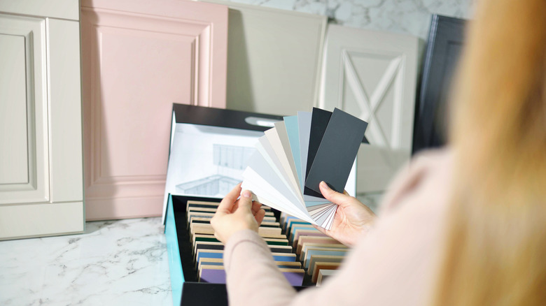 The Go-To Cabinet Color And Finish That's Now Tired, Basic, And Outdated