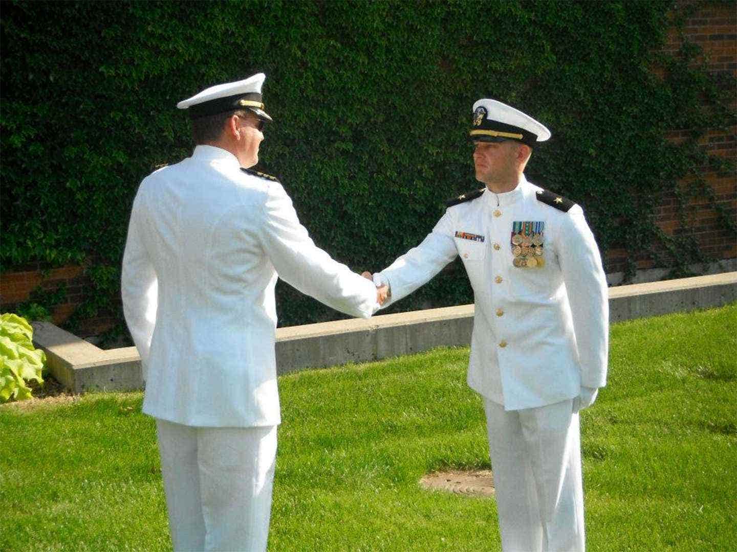 Records show that Republican Senate candidate Adam Schwarze (right) voted in the 2012 election in person despite his being out of state for Navy SEAL training.