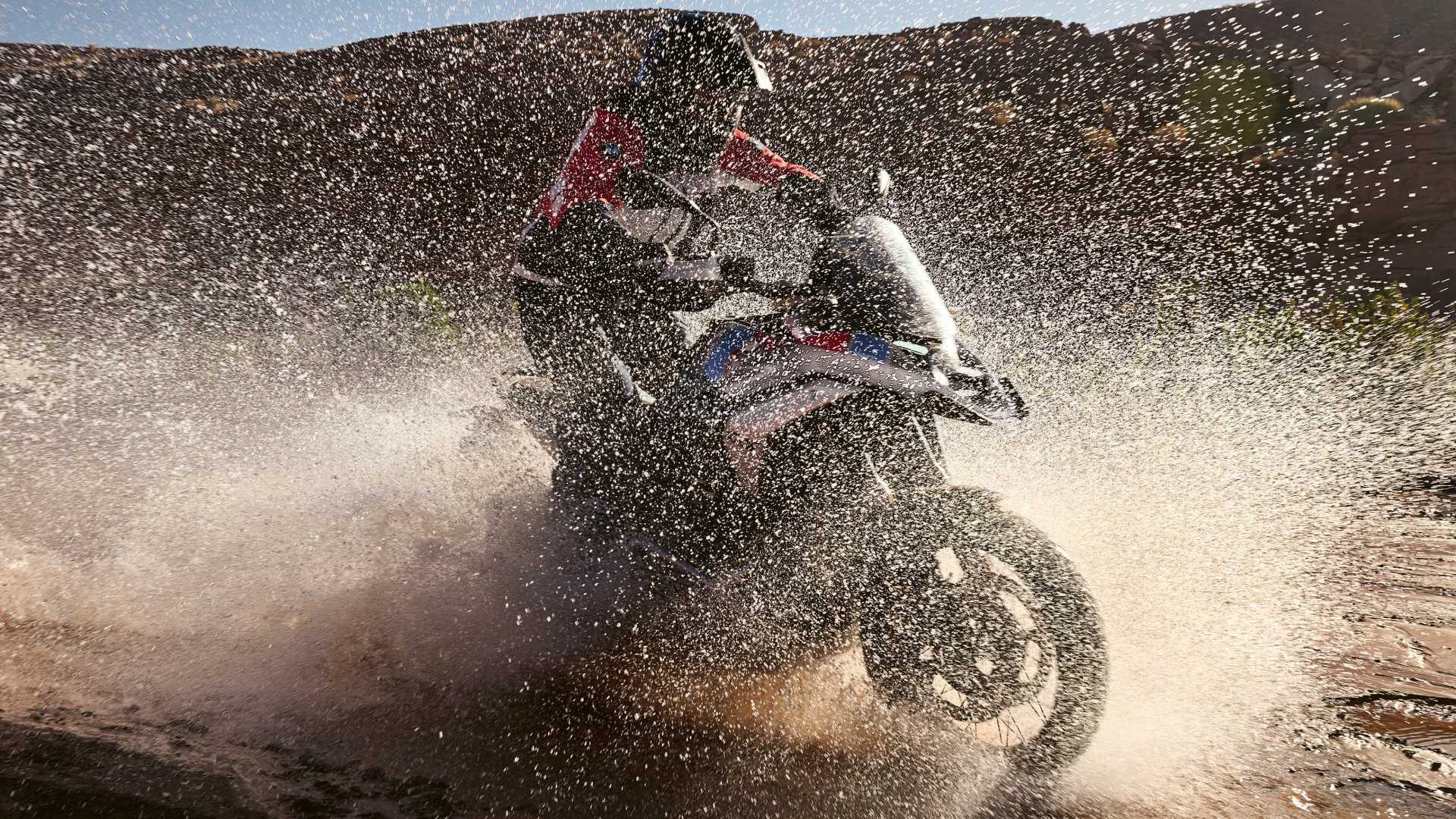 2026 BMW R 1300 GS off-roading through a wet patch cinematic shot