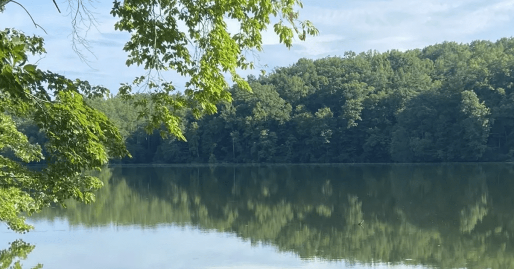Peaceful reflections bounce off of Fairy Stone Lake, a beautiful lake in Virginia.