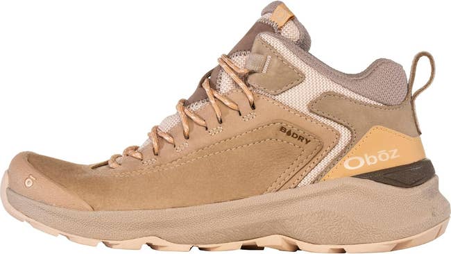 A hiking shoe with a rugged design, featuring a suede-like finish, durable sole, and lace-up front, ideal for outdoor activities