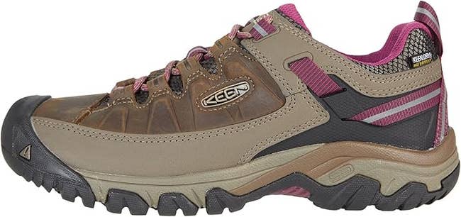 Outdoor hiking shoe with rugged design and durable material, featuring a protective toe cap and waterproof technology. Ideal for trail adventures