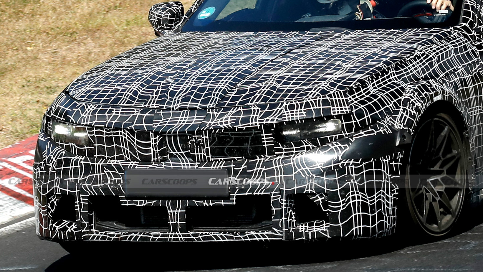 BMW’s next M3 loses its grille but keeps its six, and maybe the clutch too