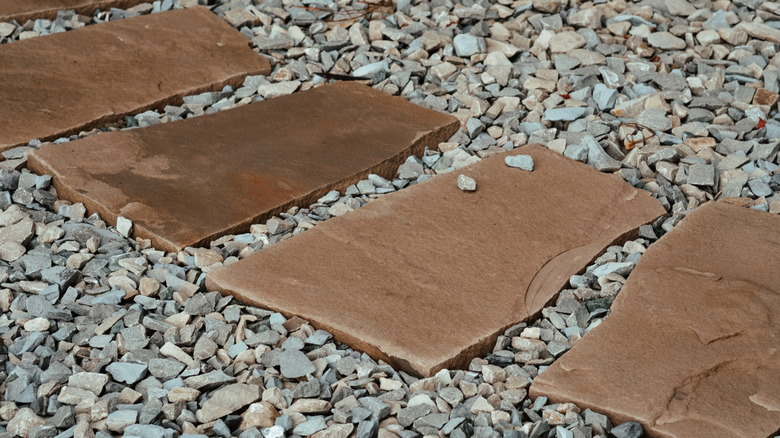 The Genius Way That HGTV's Property Brothers Keep Gravel In Place