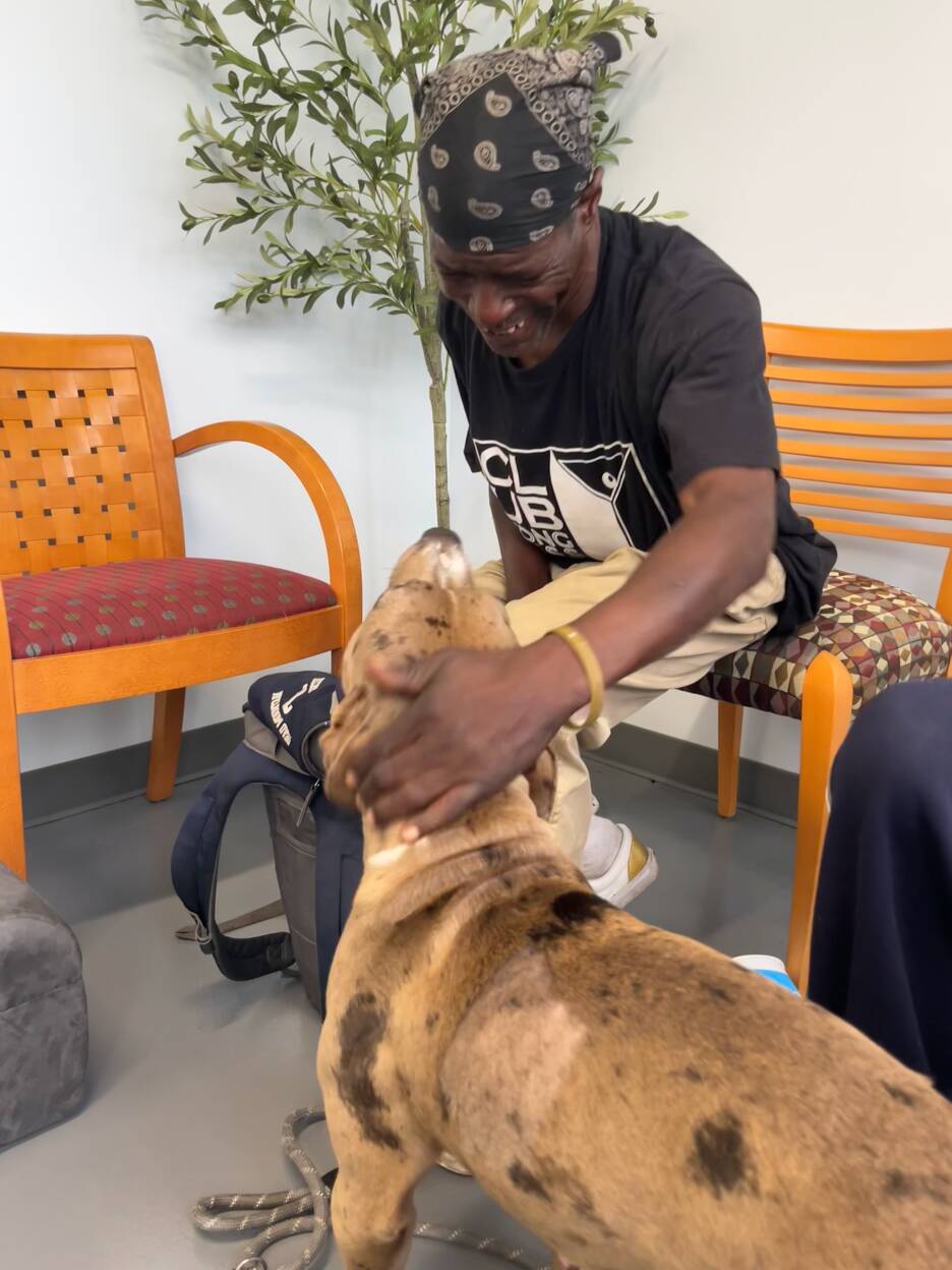 Devoted Dog Dad Sleeps Outside Vet Clinic To Get Help For His Injured Pup