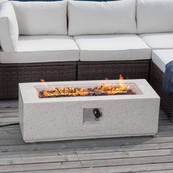 a long rectangular terrazzo firepit