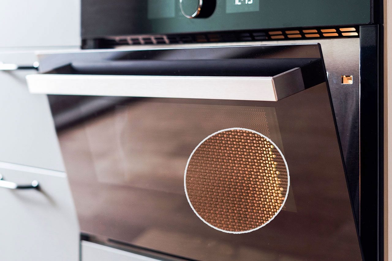 Here’s why your oven door has tiny dots on it