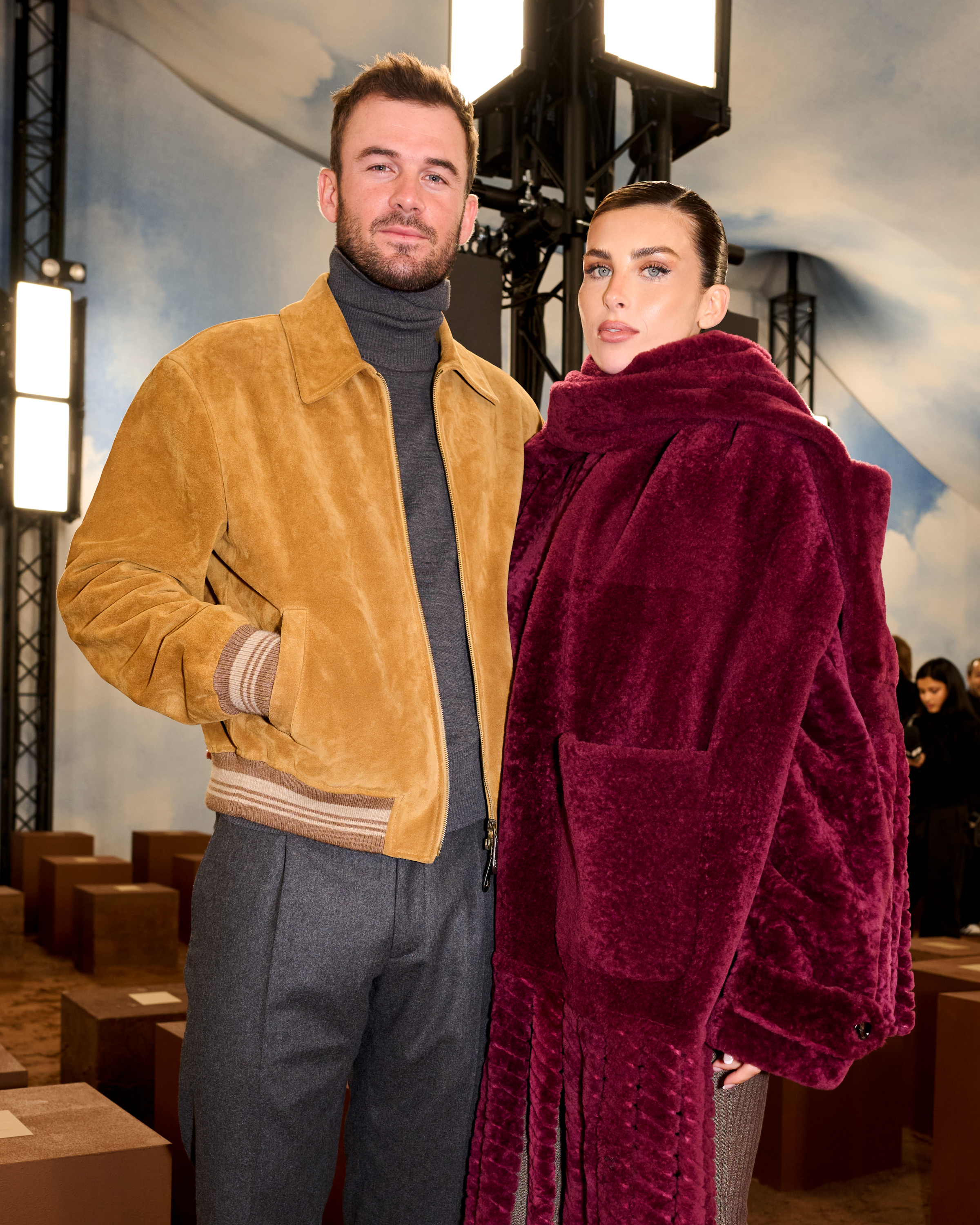 Tommy Paul and Paige Lorenze attending the Burberry fashion show.