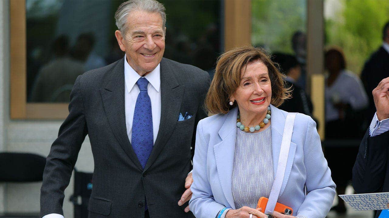 Former House Speaker Nancy Pelosi, D-Calif., and her husband, Paul Pelosi, attend the dedication ceremony for the Barack Obama Presidential Center in Chicago on June 18, 2026. Paul Pelosi is facing a misdemeanor hit-and-run charge in connection with a Friday crash in Napa County, California, authorities said.