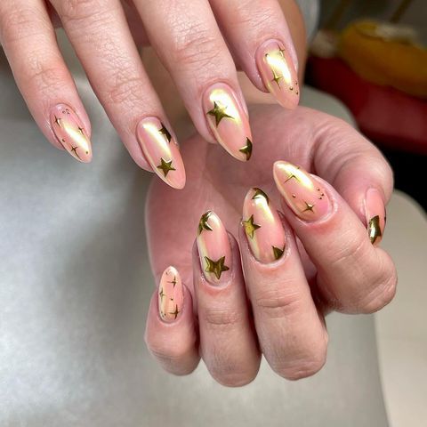 Gold Chrome and Star Nail Art