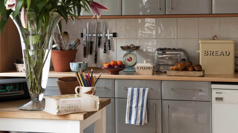 The Go-To Cabinet Color And Finish That's Now Tired, Basic, And Outdated