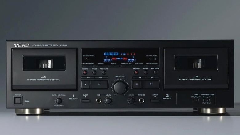 Studio photo of a Teac W-1200 in front of a gray backdrop
