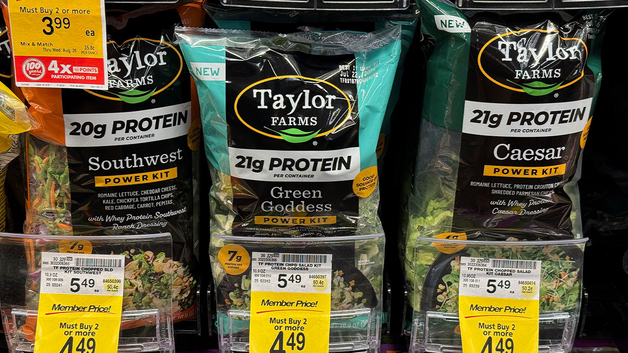Packages of Taylor Farms salad greens are displayed at a Safeway store in Kings Beach, California, on July 16, 2026. Bloomberg News reported Taylor Farms is preparing a recall tied to ingredients under investigation in a multistate cyclospora outbreak. The company says its branded salad kits are not associated with the illnesses.