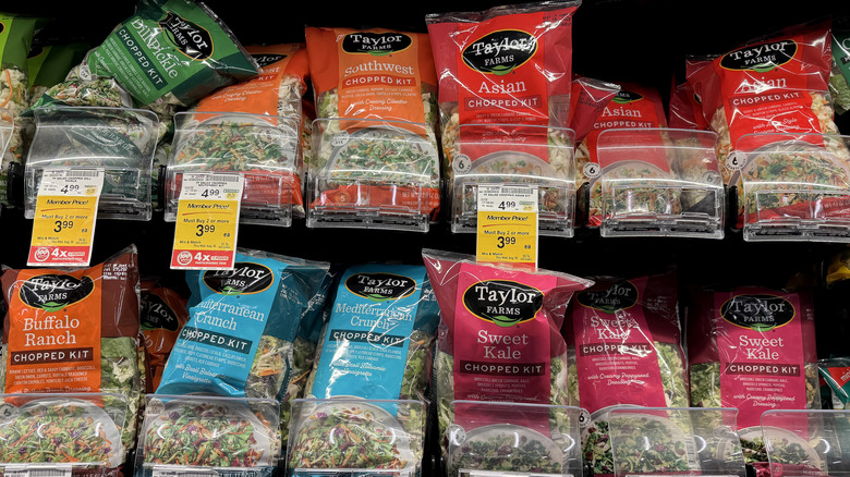 Rows of Taylor Farms bagged salad kits on display at a Safeway store in Kings Beach, California