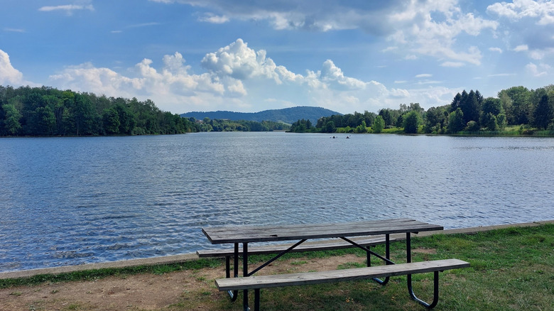 Picnic table in front of Leaser Lake and hills in Pennsylvania