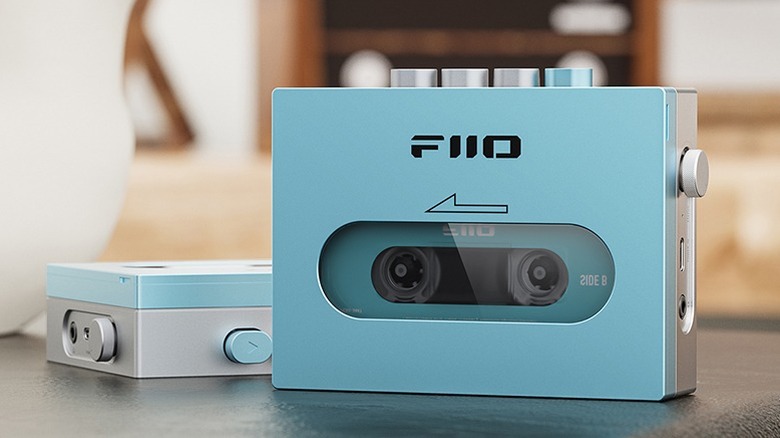 Aqua Fiio CP13 cassette player on a table with a second unit in the background