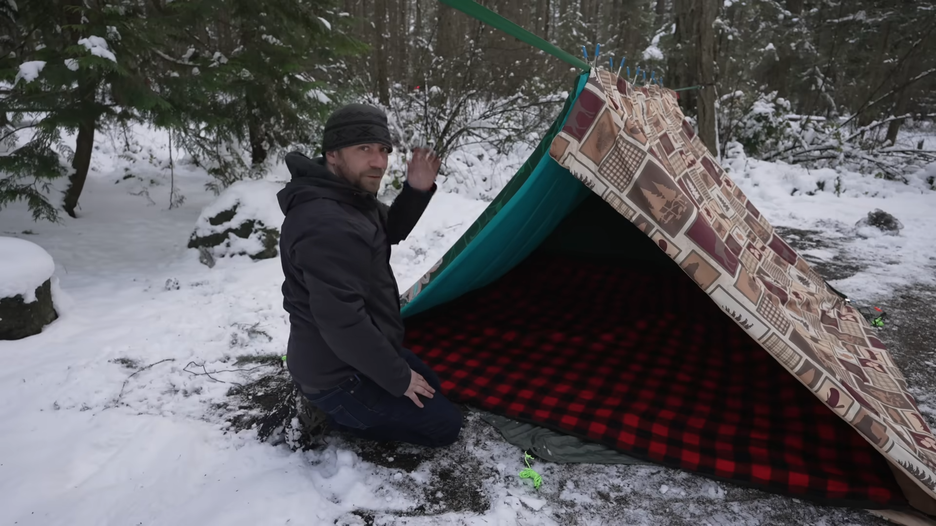 He built a giant blanket fort then slept inside during a snowstorm