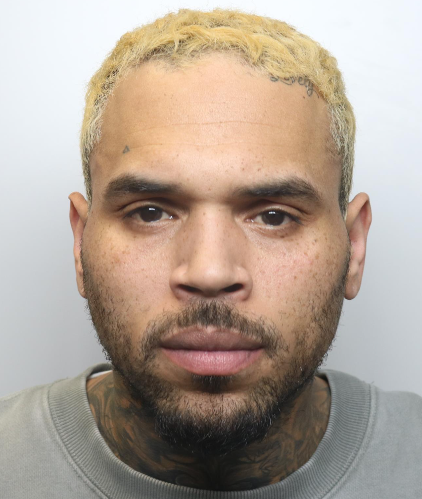 Chris Brown seen on CCTV attacking man with bottle in London nightclub
