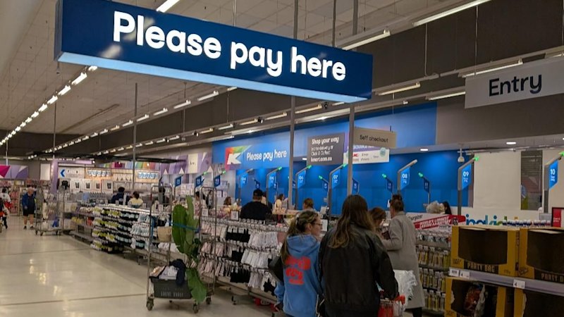 Australian retail giants weigh technology against staffed checkouts