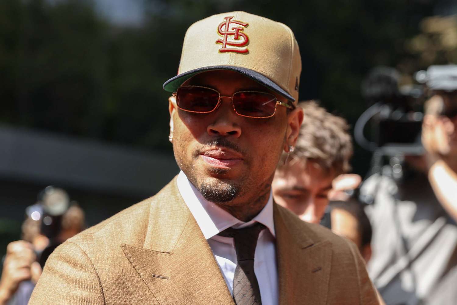 Chris Brown pleads guilty over alleged nightclub attack, will face ...
