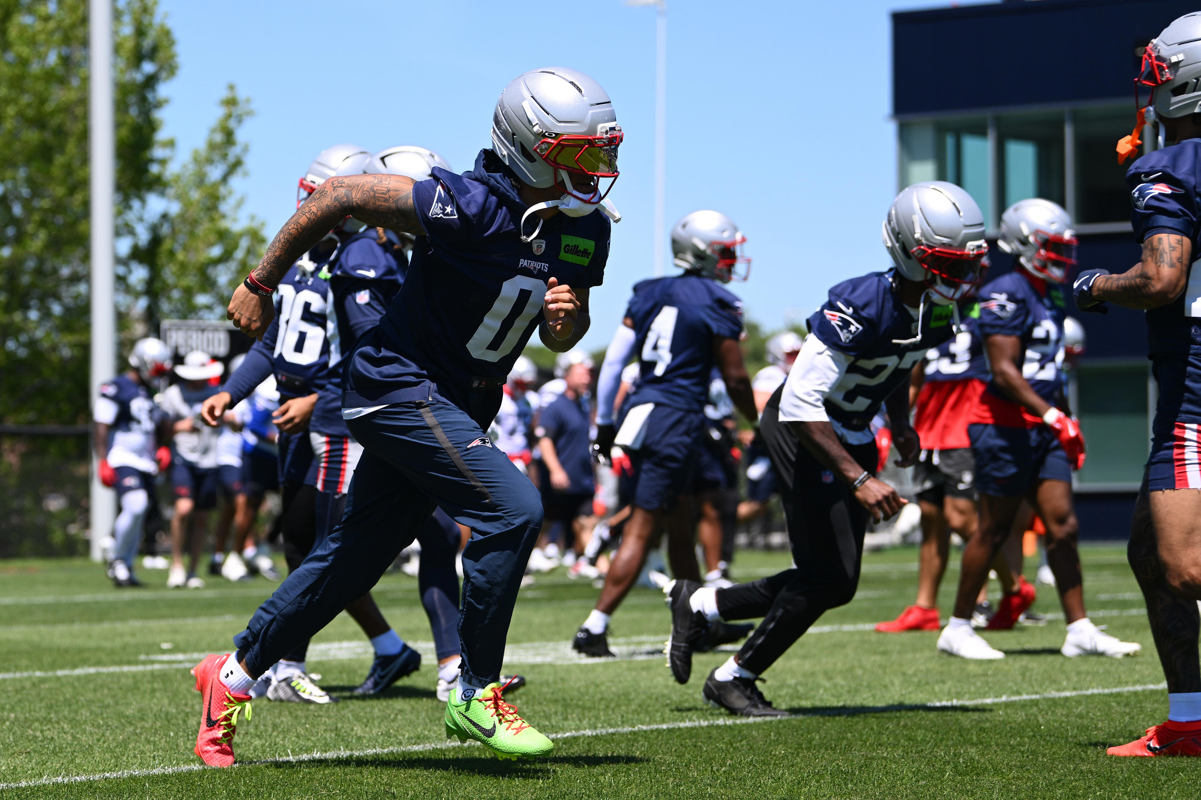 Did Patriots CB Christian Gonzalez report for training camp?