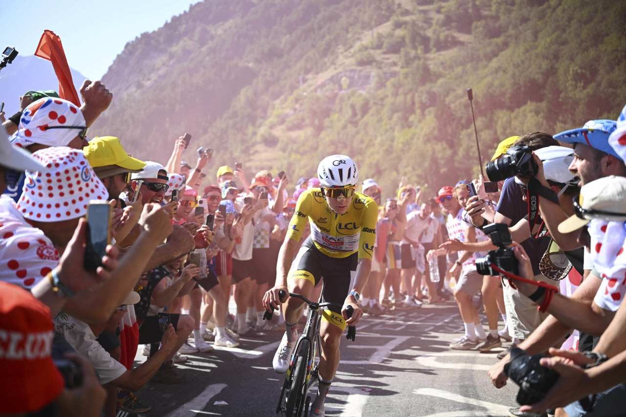 Bikes, banana costumes, and 600,000 fans: Watching Pogacar on the Alpe d'Huez