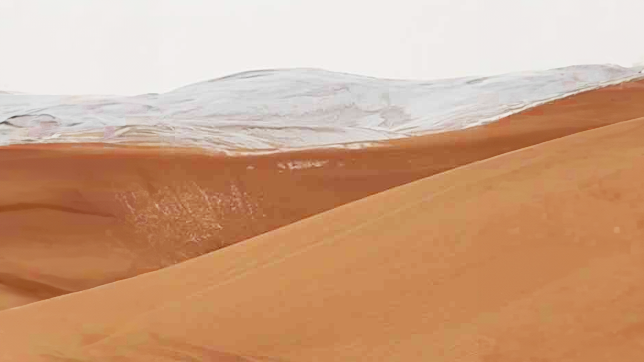 Rare snowfall transforms the Sahara Desert