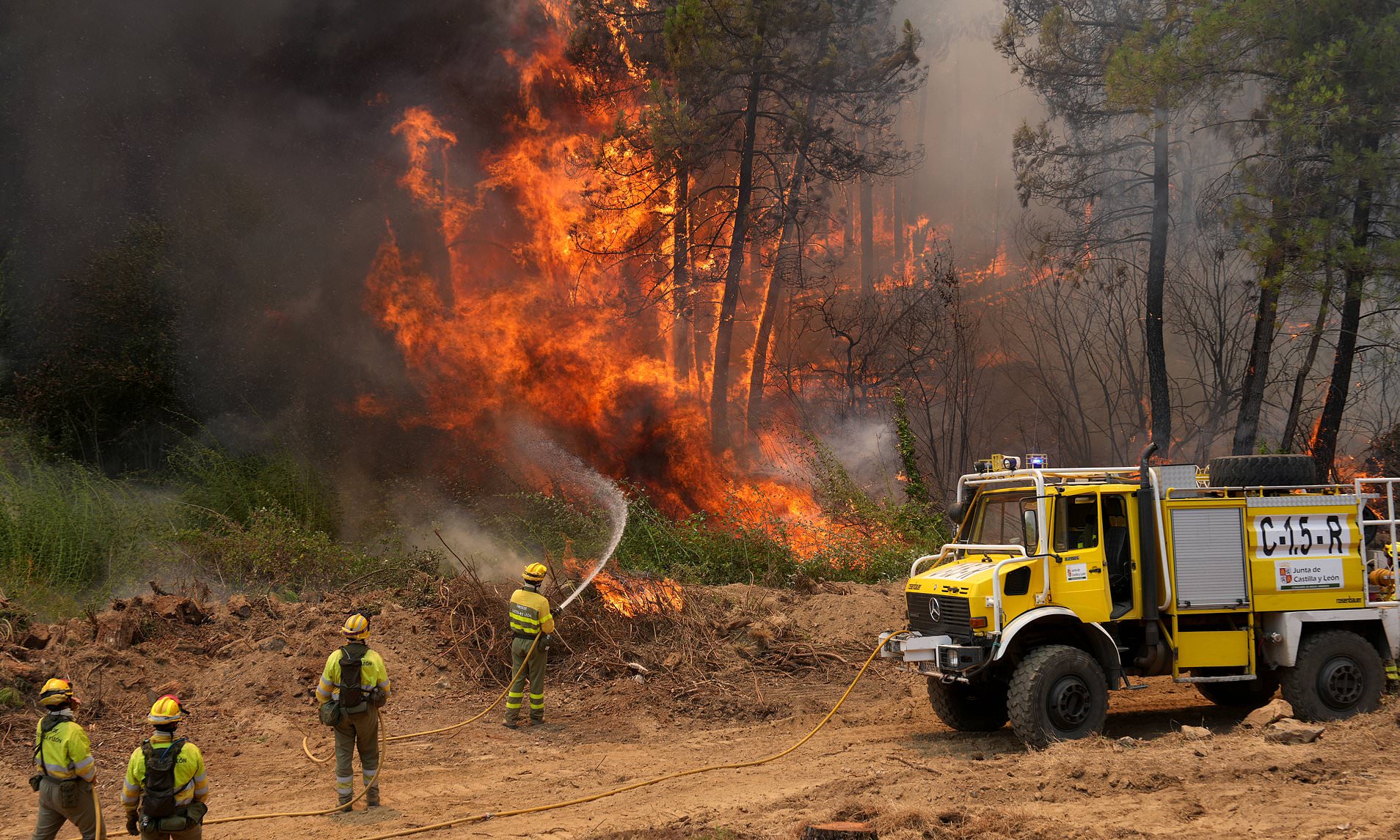 Military sent in to tackle wildfires as 270,000 are forced from homes by blazes in Spain and France