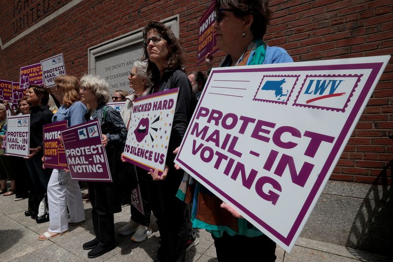Supporters gather outside the federal courthouse after a hearing in a lawsuit brought by a coalition of Democratic state attorneys general seeking to block U.S. President Donald Trump's executive order tightening rules on mail-in voting, in Boston, Massachusetts, U.S., June 2, 2026.  REUTERS/Brian Snyder