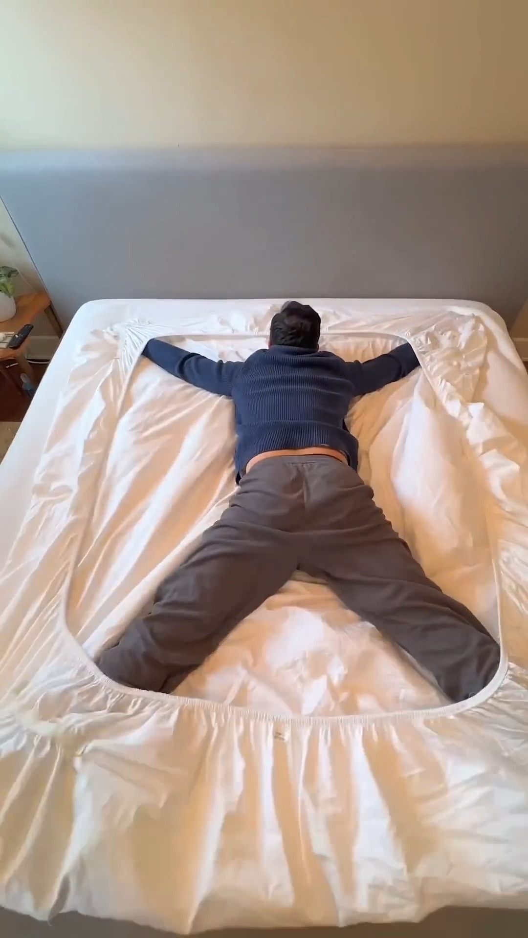 When you put on fitted sheets...